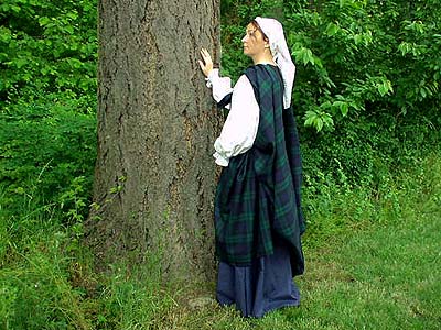 A woman in highland garb