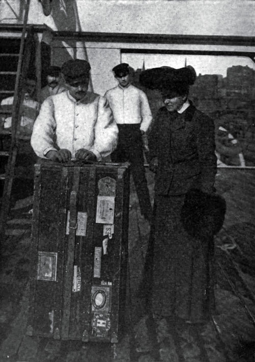 A steward handling luggage